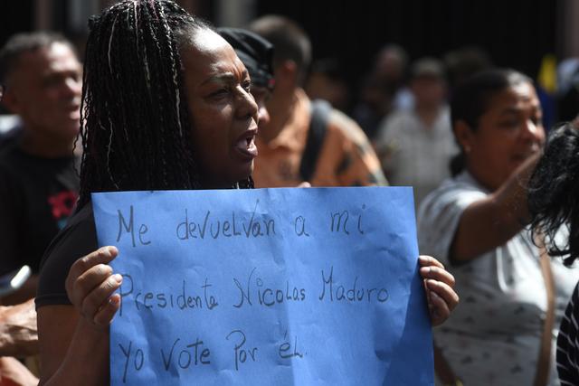 第1现场｜遭袭后的委内瑞拉：药店排队、油站关闭、民众集会抗议  第2张